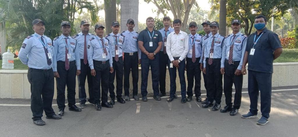 Uniformed Grace Security retail officer greeting customers